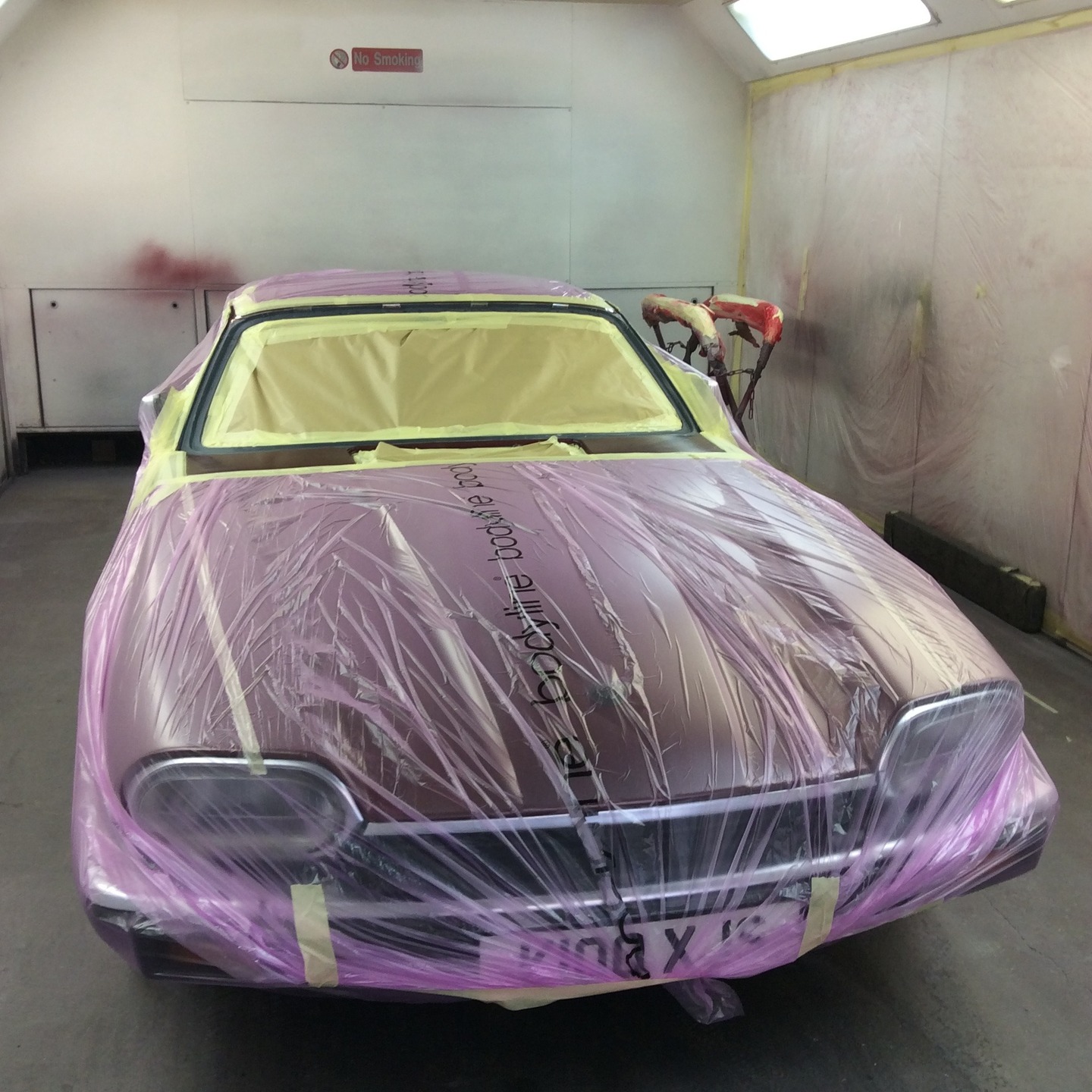 Vehicle in the spray booth